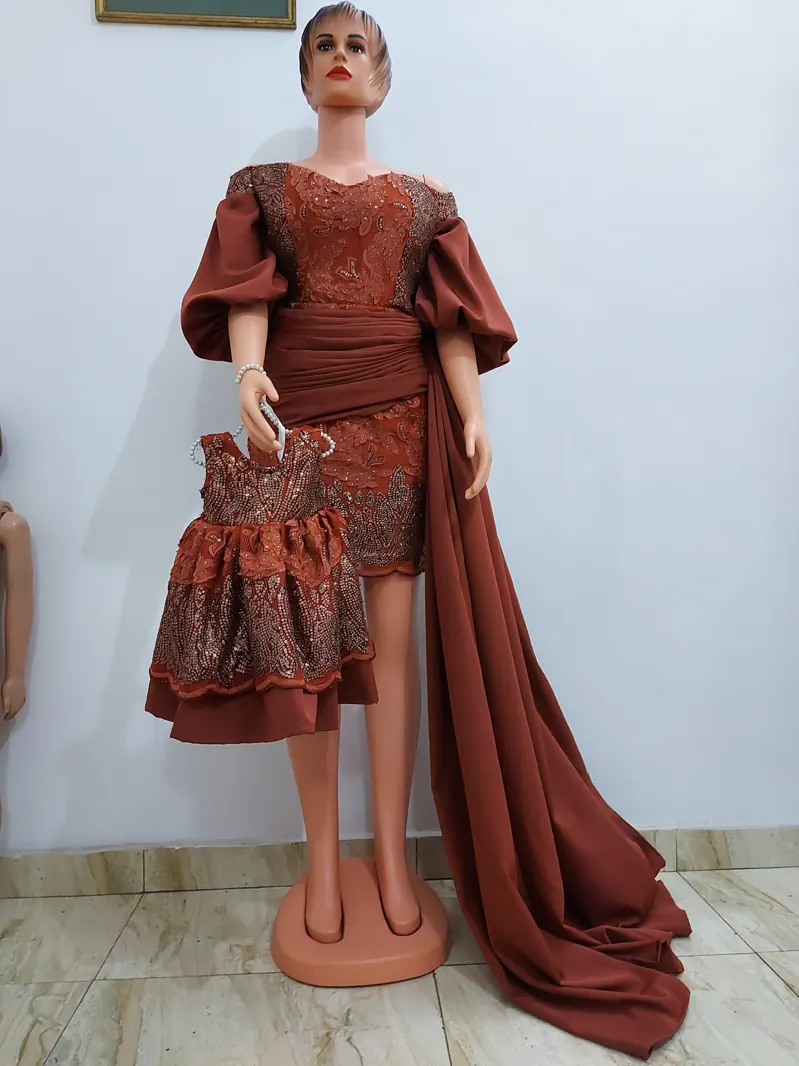 Rust lace dress with draped train