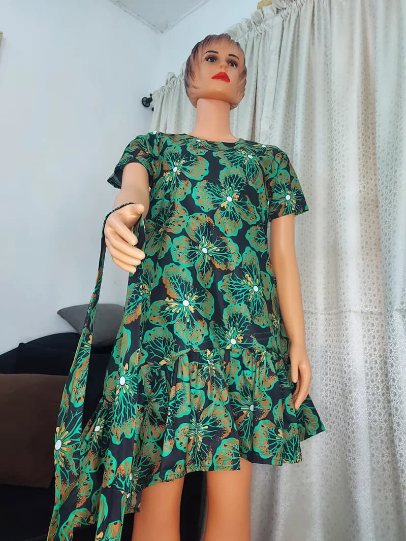Green leaf-print ruffle dress