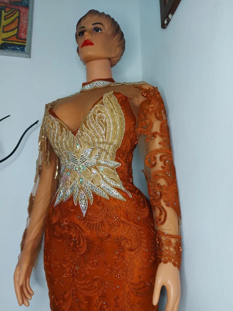 Orange and gold beaded gown