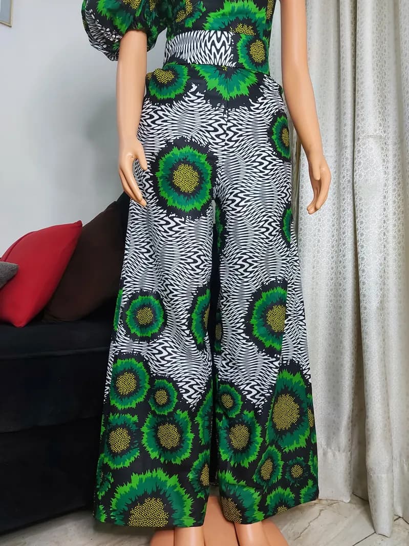 Green circle-print top and palazzo trousers