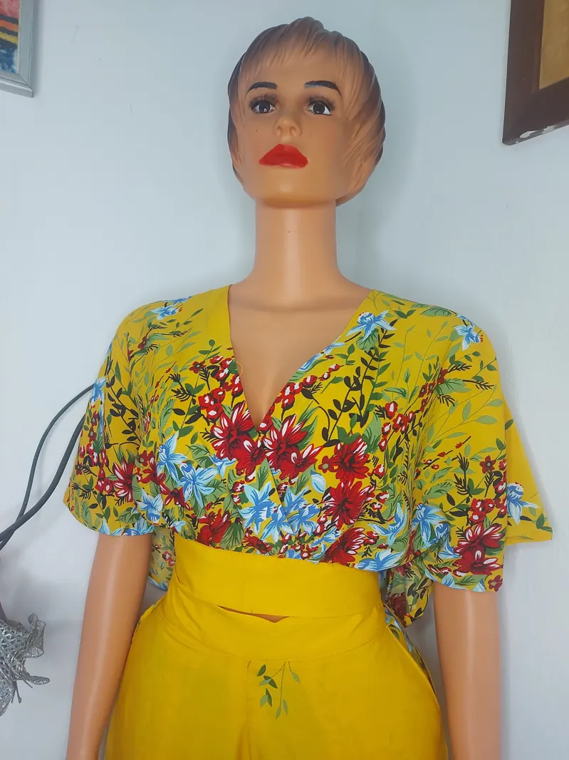 Yellow floral blouse and trousers