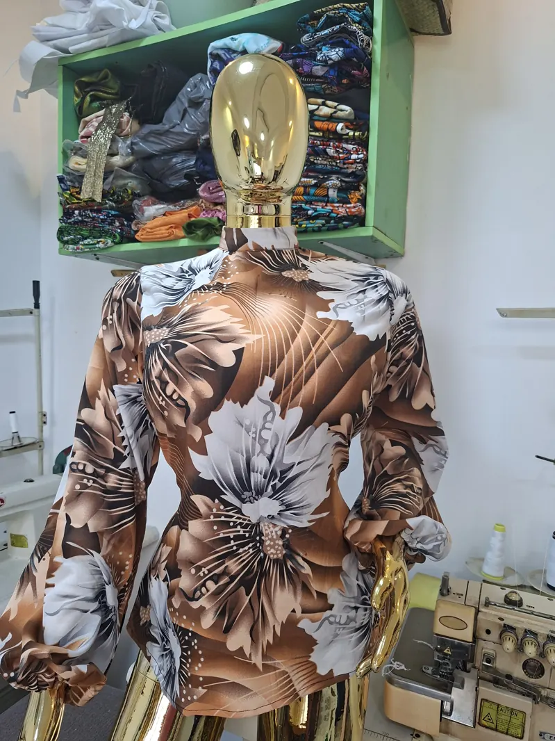 Brown floral blouse and trousers
