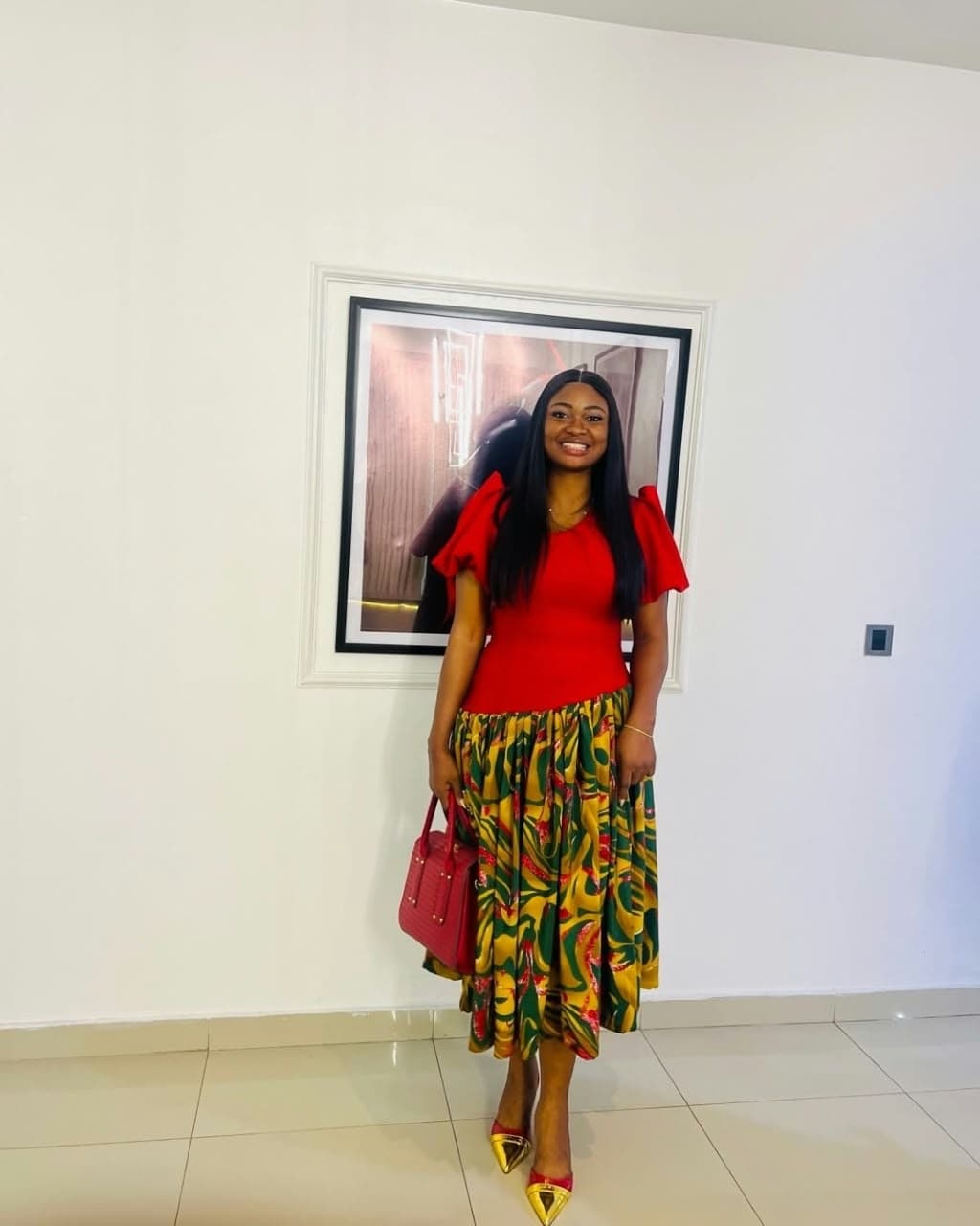 Ankara midi skirt with a red ruffle-sleeve top