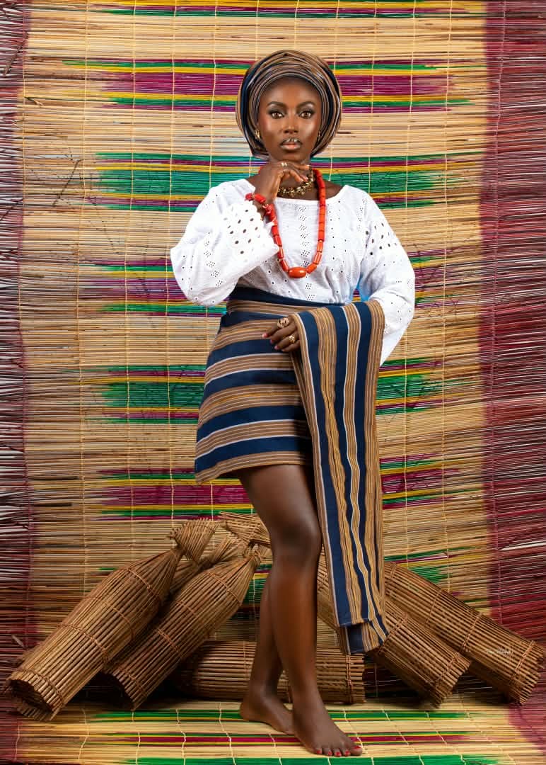 Aso-oke wrapper with an eyelet blouse