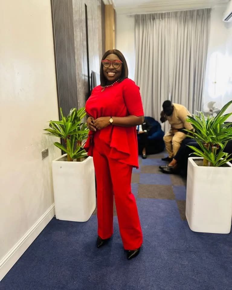 Red peplum top and trousers