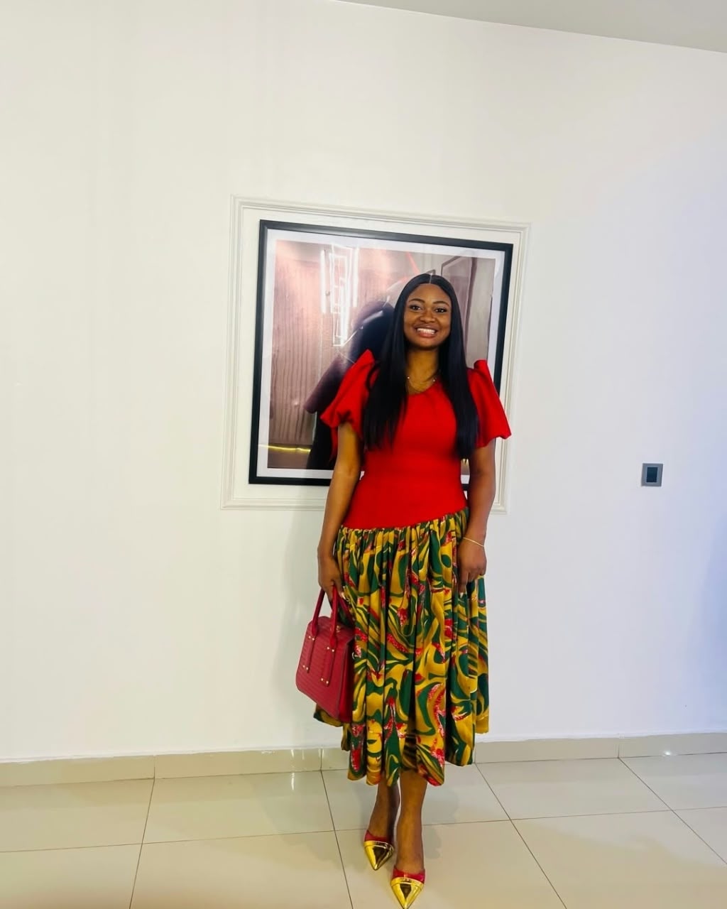 Ankara midi skirt with a red ruffle-sleeve top
